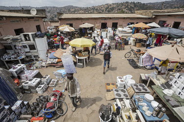 Second-hand electrical goods, imported from the West, for sale in a market. Many shops sell these 'bilokos' â�" a corruption of 'bill of costs' and 'biloko', which means goods in Lingala. The Congole...