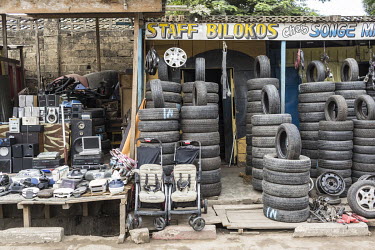 Second-hand goods and tyres imported from the West for sale in a market. Many shops sell these 'bilokos' â�" a corruption of 'bill of costs' and 'biloko', which means goods in Lingala. The Congolese...
