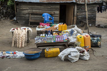 A stall selling various items that might be of use to a traveller taking a ship upriver from the nearby port.