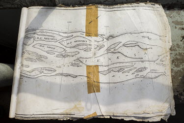 A colonial-era map of the Congo River showing sandbanks and navigable channels. Since independence in 1960 no new maps have been produced leaving sailors to rely on these old ones that are copied over...