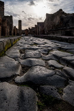 One of the paved main streets in the ancient Roman city of Pompeii.