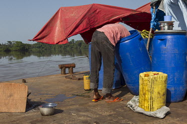 A man working on a Congo River barge.