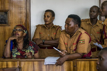 At the Buganda Road Chief Magistrate's Court Makerere University Researcher Dr. Stella Nyanzi listens from the dock, at the start of the the first of many hearings held to determine if Nyanzi has a ca...