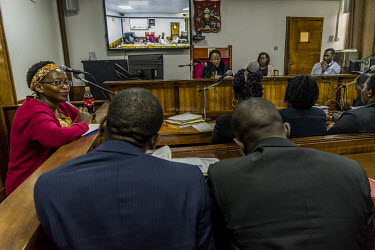 At the Buganda Road Chief Magistrate's Court Makerere University Researcher Dr. Stella Nyanzi sits in the dock during a hearing held to determine if she has a case of 'Computer Misuse' to answer regar...