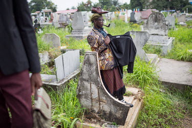 Every year on February 10 sapeurs visit the grave of their spiritual father, the musician Adrien Mombele Samba N'gantshie, aka Stervos Niarcos, in Gombe cemetery.   These often unemployed youngsters c...