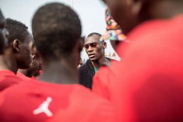 Bismarck Biyomgo speaks to basketball players training at a camp her has organised in Kinshasa. Biyombo is a famous basket ball player of Congolese origin. Every year he organises basketball training...