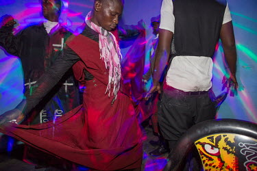 People dance in a bar in Kinkole near Kinshasa.