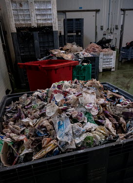 A container full of packaging from dairy products that have passed their expiry dates stored at the Abapor-ETSA recycling plant. Various food stuffs and packaging will be processed into dog and cattle...