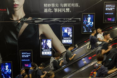 Protestors, dressed in black, exit the MTR in Causeway Bay as they head out to join the mass demonstrations against the extradition bill, police use of force during protests and to demand Chief Execut...