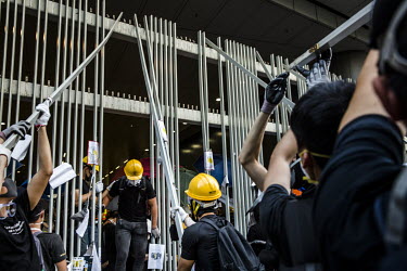 Protesters storm the Legislative Council following a huge demonstration against the extradition bill, police use of force during protests and to demand Chief Executive Carrie Lam's resignation.