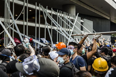 Protesters storm the Legislative Council following a huge demonstration against the extradition bill, police use of force during protests and to demand Chief Executive Carrie Lam's resignation.