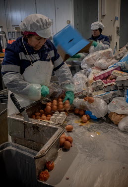 Workers at the Abapor-ETSA recycling plant separate date expired eggs from their packaging. The various waste food and packaging will be processed into dog and cattle food, organic fertilizer, cosmeti...