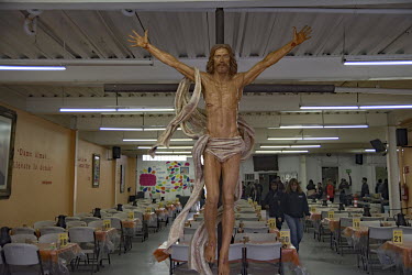 A statue of Christ on a Cross at the Desayunador de Padre Chava, a facilty provided by the Catholic Church where the homeless, migrants and urban poor are offered a free breakfast and social services...