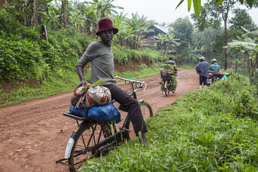 Men on their way to the market in the centre of Butembo.