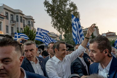 Supporters congratulate Kyriakos Mitsotakis after he gave a speech at a rally prior to his 2019 general election victory.
