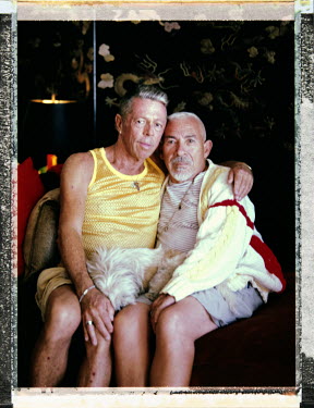 63 year-old, Welsh-Jew gay/bisexual Rich Burton Jr expresses his gender identity as 'sexual'. He sits with his 72 year old live in domestic partner, white, gay man Pedro Barrios.
