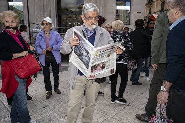 A man reading La Stampa newspaper on Piazza Vittorio Veneto. Matera, a UNESCO World Heritage Site, is European Capital of Culture 2019.