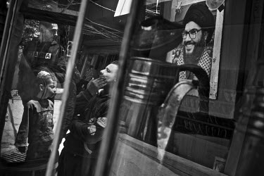 A picture of Hassan Nasrallah at a coffee stall in Beddawi Palestinian refugee camp.