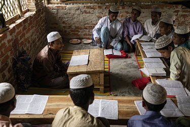 Ashraf Ali, a teacher at madrassa Dar el Hekma Rohingya refugee Camp1W in the Kutupalong extension site where 270 children study seven subjects, all of them with a religious theme. Madrassas have emer...
