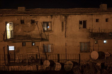 Satellite dishes attached to an old house in the small town of Hasankeyf, continuously inhabited for 12,000 years, but doomed to disappear beneath an artificial lake as a result of the Ilisu hydroelec...
