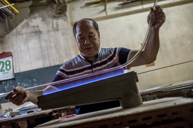 Wong Kin Wah (78), better known as Master Wong, is one of the last neon masters in Hong Kong. For over sixty years he has been creating the gas discharge lights in his workshop in the Mong Kok neighbo...