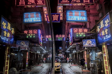 Neon lights jostle among LED illuminations on Portland Street in Kowloon. The street still retains a handful of prominent neon lights, despite the reduction of their use across the city.