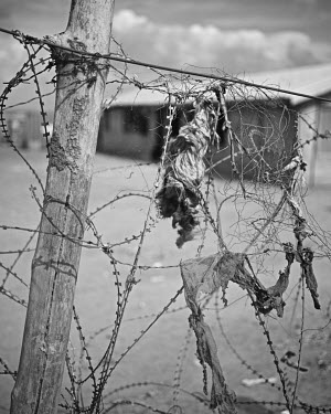 Razor wire outside Juba Weigh Station which was converted into a refugee camp for Internally Displaced People who fled fighting in late 2014.