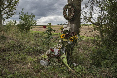 Roadside shrine for a young man, killed in a road accident.