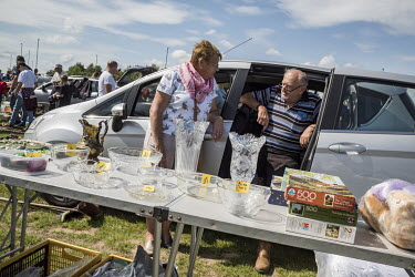 A couple selling bric-a-brac at a regular car boot sale in South Holland.  In the 2016 referendum on Britain's position within the EU, the South Holland district produced the second highest pro-Brexit...