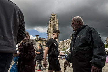 Boston's twice-weekly market, with the Boston Stump, the tower of St Botolph's Church, behind.  In the 2016 referendum on Britain's membership of the EU, the Boston district produced the highest pro-B...