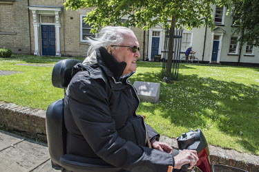 A pensioner on a mobility scooter in the grounds of St Botolph's Church.  In the 2016 referendum on Britain's membership of the EU, the Boston district produced the highest pro-Brexit vote, 75.6% per...