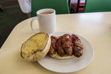 A cup of tea and a sausage bap in a cafe on the fringe of Surfleet, an agricultural village between Boston and Spalding.