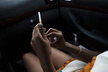 In pain and overdue for a dose, Grace Kudzu (35) prepares to inject herself with 100mg of tramadol in the front seat of a friend's car. She explains that she prefers to be seen to by a medical profess...