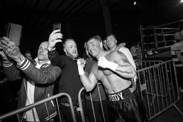 Andy Roberts celebrates with fans after his win against Danny Leadbetter at the Ultimate Bare-Knuckle boxing competition at Manchester's Bowlers Exhibition Centre, Old Trafford.