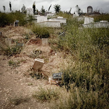 The grave of Siham Muhammad (24) in the Yesilkent cemetery. Siham's burned body, charred beyond all recognition, was found hidden under a pile of stones in a field near the Syrian border. It took two...