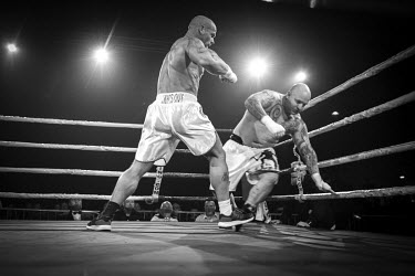 Lee McGarry (left) and Stanley Hofstaedter (right) during their bout at the Ultimate Bare-Knuckle boxing competition at Manchester's Bowlers Exhibition Centre, Old Trafford.
