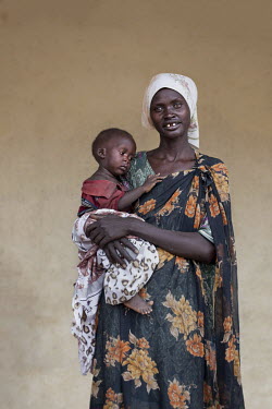 Aluel Wol (40) with her baby who is being treated at a mother and baby nutrition clinic for malnourished children.