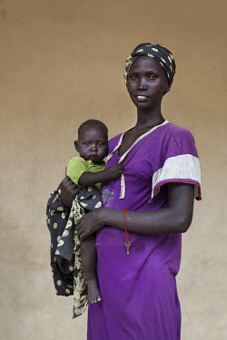 A mother and her baby who is being treated at a mother and baby nutrition clinic for malnourished children.