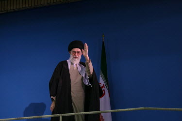 Supreme leader Ayatollah Ali Khamenei waves to the crowd after a speech where he warned that any US attack against the Islamic republic would prompt a retaliation that would harm American interests 'i...