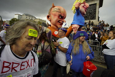 A float depitcting Dominic Cummings holding Boris Johnson like a puppet joins Anti-Brexit protesters on the Peoples' Vote March demonstration walk to the Houses of Parliament in Westminster. An estima...