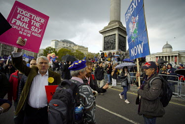 Pro & Anti-Brexit protesters meet on the Peoples' Vote March demonstration walk to the Houses of Parliament in Westminster. An estimated 1 million people took part in the event, protesting against Bor...