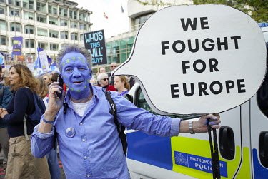An anti-Brexit protester on the Peoples' Vote March demonstration holds a sign reading 'We fought for Europe'. An estimated 1 million people took part in the event, protesting against Boris Johnson's...