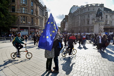 Two protesters hold a European Flag aloft at an anti-Brexit Rally on so-called 'Super Saturday', 19th October 2019, when the decision whether to accept Boris Johnson's Brexit deal made with the EU, or...