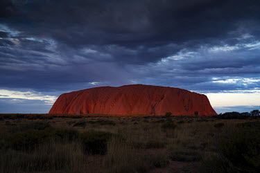 A view of Uluru at sunset.   Tourists are rushing to climb world heritage-listed Monolith, Uluru in Australia's central desert before a ban on climbers takes effect. The date of the closure, 26 Octo...