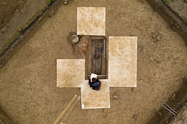Marina Nesterova, director of excavations, takes a graphical fixation and a drawing of the burial place that French and Russian archeologists believe to be the burial place of General Gudin, who died...