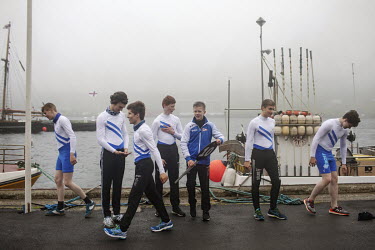 A rowing team who just won a contest during the Joansoeka midsummer festival.