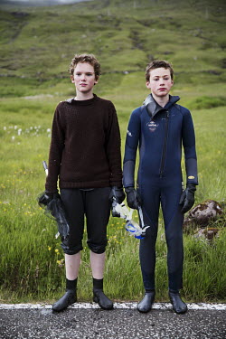 Fridi and Asbjorn, both 13, with their diving gear to go diving for fish in the river in Hvalvik. They catch the fish by hand.