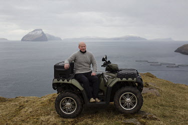 Kjell (46) with his ATV. He has a few sheep and works at the airport. He is unmarried, having, he says, ''never met the right woman''.