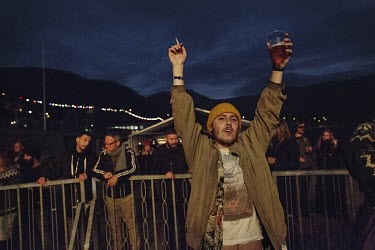 Fridi, 27, smokes and drinks beer during the G! music festival in Sydragøta. He grew up in this small village, but now lives and works in Torshavn, the capital, with his girlfriend. 'Faroese women ar...