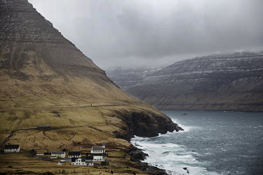 The church in Vidareidi, which is the northern most settlement in the Faroe Islands on the island Vidoy. The houses are spread out over the evergreen valley, protected by high mountains on two sides....